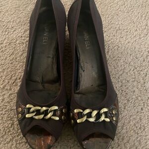 Brown small wedge heel shoes in excellent condition. Worn once.